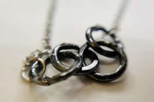 silver 4 rings necklace
